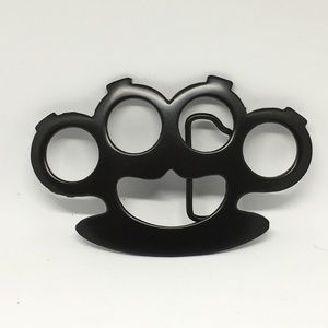Black Belt buckle in the shape of Brass Knuckles